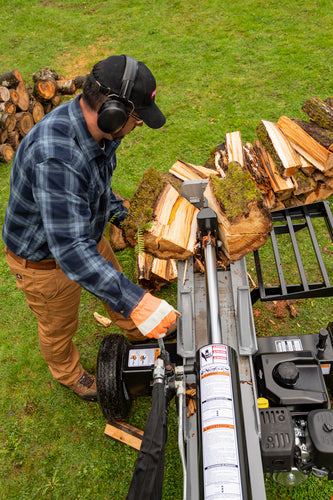 Oregon 35-Ton Gas Log Splitter in action, splitting logs efficiently with powerful performance.